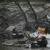 Broken trees and overturned vehicles after the Guadalupe River flash flood in Kerrville, Texas.