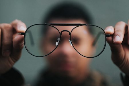 Image of a person looking through eyeglasses
